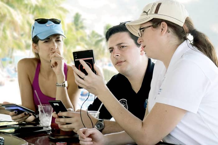The Guest Experience Maximization team troubleshooting Ocean Medallion technology