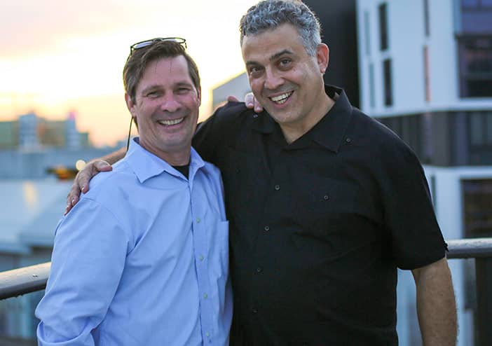 Guest Experience Maximization leadership smiling at office party in Doral, Florida
